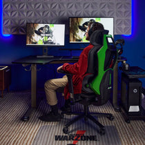 Eureka Ergonomic Typhon Hybrid Gaming Chair in Gaming Setup With Call of Duty Warzone, Ergonomic Design, Green Accents.