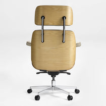 Eureka Ergonomic Mathias executive chair rear view, light wood veneer shell, beige leather seat, silver base.