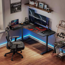 L-Shaped Gaming Desk With Triple Monitors, Gaming Chair, and Neon Lights - Ergonomic Gaming Setup.