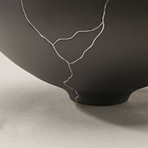 Dark Gray Ceramic Vase With Silver Crack Detailing, Perfect for Dining Table Or Shelf Decor.