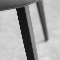 Milo Dining Chair Detail: Black Metal Leg and Gray Upholstered Seat, Modern Dining Furniture.