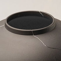 Dark Gray Ceramic Vase With Silver Crack Detailing, Perfect for Dining Table Or Shelf Decor.