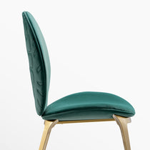 Emerald Green Katalea Velvet Dining Chair, Embossed Back, Gold Legs, Modern Design.