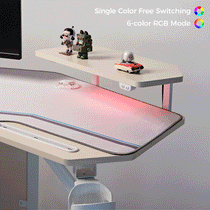 Eureka Ergonomic Aero Wing Shaped Studio Desk with RGB lighting, monitor riser, and figurines.