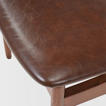 Brown Leather Dining Chair Seat Detail. Mid-Century Modern Dining Chair With Leather Upholstery.