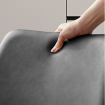 Milo Dining Chair Detail: Gray Synthetic Leather Upholstery, Demonstrating the Soft Feel.