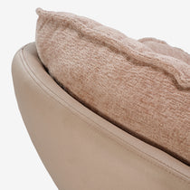 Norman Chenille Swivel Lounge Chair Close Up, Showing Plush Chenille Back and Leather-Like Material in Tan Color.