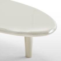 Modern White Coffee Table With Rounded Edges, Part of a Stylish Living Room Set. Contemporary Design.