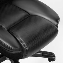 Eureka Ergonomic Close-up on black faux leather office chair seat cushion with perforated texture, stitching, and mesh side details.