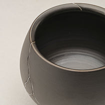 Dark Gray Ceramic Vase With Silver Crack Detailing, Ideal for Dining Table Or Shelf Decor.