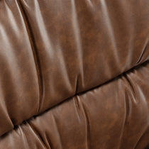 Close-Up of Brown Pu Leather Home Office Chair Upholstery, Showing Texture and Stitching Details.