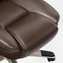 Galene Ergonomic Office Chair Detail, Brown Faux Leather Seat With Perforated Breathable Design for Tailbone Pain Relief.