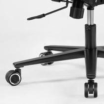 Close-up of a black office chair with wheels on a white background,black