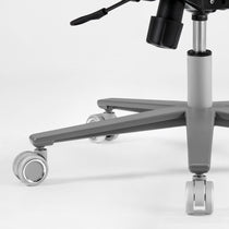 Close-up of a chair with wheels on a white background,gray