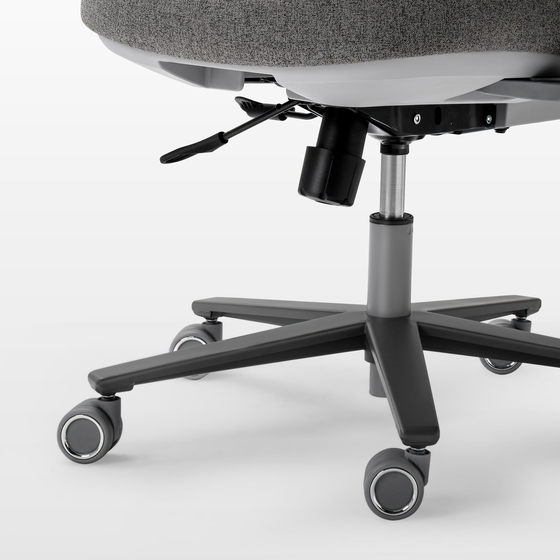 Close-up of a chair with wheels on a white background,gray