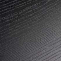 Close-Up Detail of Black Wood Grain Finish, Standing Desk Surface.