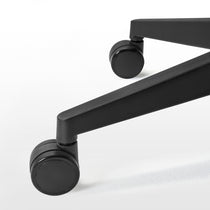 Eureka Ergonomic Lira ergonomic office chair close-up of black dual-wheel casters and textured frame, highlighting mobility.