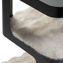 Close-Up Cat Tower Detail With Plush Cat Bed. Black Iron Frame and a Cozy Resting Area.