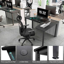 Black L-Shaped Eureka Ergonomic Desk Setup With Triple Monitors, Mouse Pad, Ergonomic Chair.