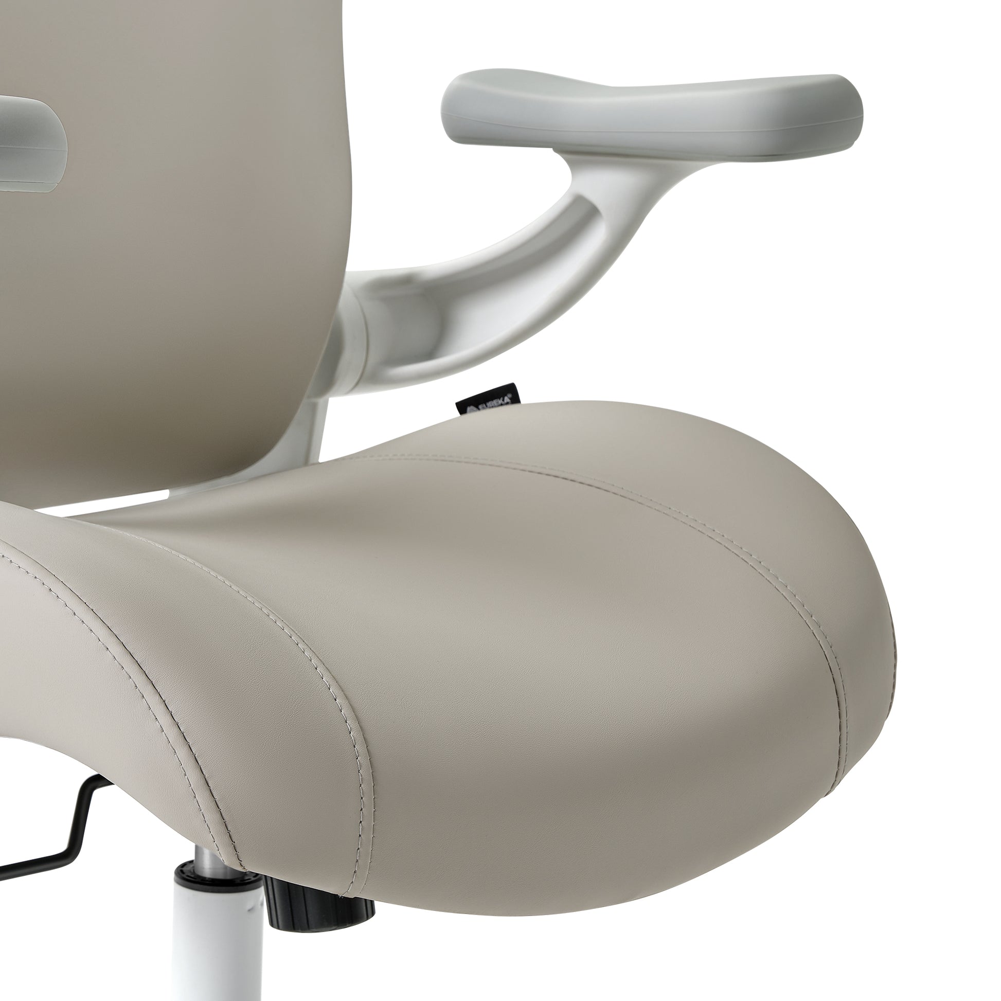 Close-up of a beige office chair with a soft cushion, beige