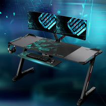Eureka Ergonomic Gaming Desk With Ergonomic Design, Black Frame, and Dual Monitors Setup.