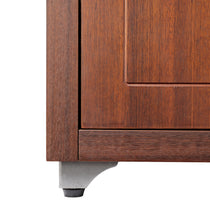 Eureka Ergonomic Walnut Bookcase Corner Detail. Walnut Wood Grain, Metal Leg, and Cabinet Door.