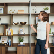 Napa Wood Bookcase Cabinet With Woman, Adjustable Shelves, and Walnut Finish.