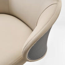 Eureka Ergonomic Close-up of Royal Rowan beige microfiber leather executive chair armrest with perforations and ribbed gray detail.