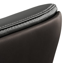 Eureka Ergonomic Close-up of Royal Slim executive chair seat cushion, showcasing champagne leather texture, perforation detail, and stitching.