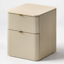 Eureka Ergonomic Opal fluted file cabinet in Cream, three-quarter view showing brass pulls and rounded edges