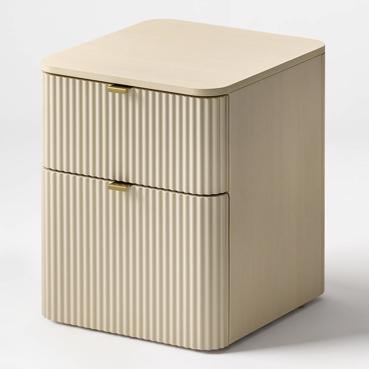 Eureka Ergonomic Opal fluted file cabinet in Cream, three-quarter view showing brass pulls and rounded edges