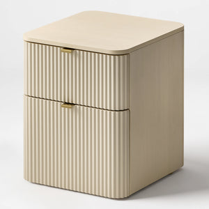 Eureka Ergonomic Opal fluted file cabinet in Cream, three-quarter view showing brass pulls and rounded edges