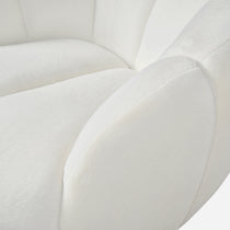 White Adele Swivel Chair Detail, Showing Soft Fabric and Curved Backrest for Modern Living Spaces.