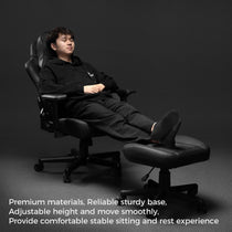 Black Ergonomic Chair With Footrest, Offering Comfortable and Stable Sitting Posture and Rest Experience.