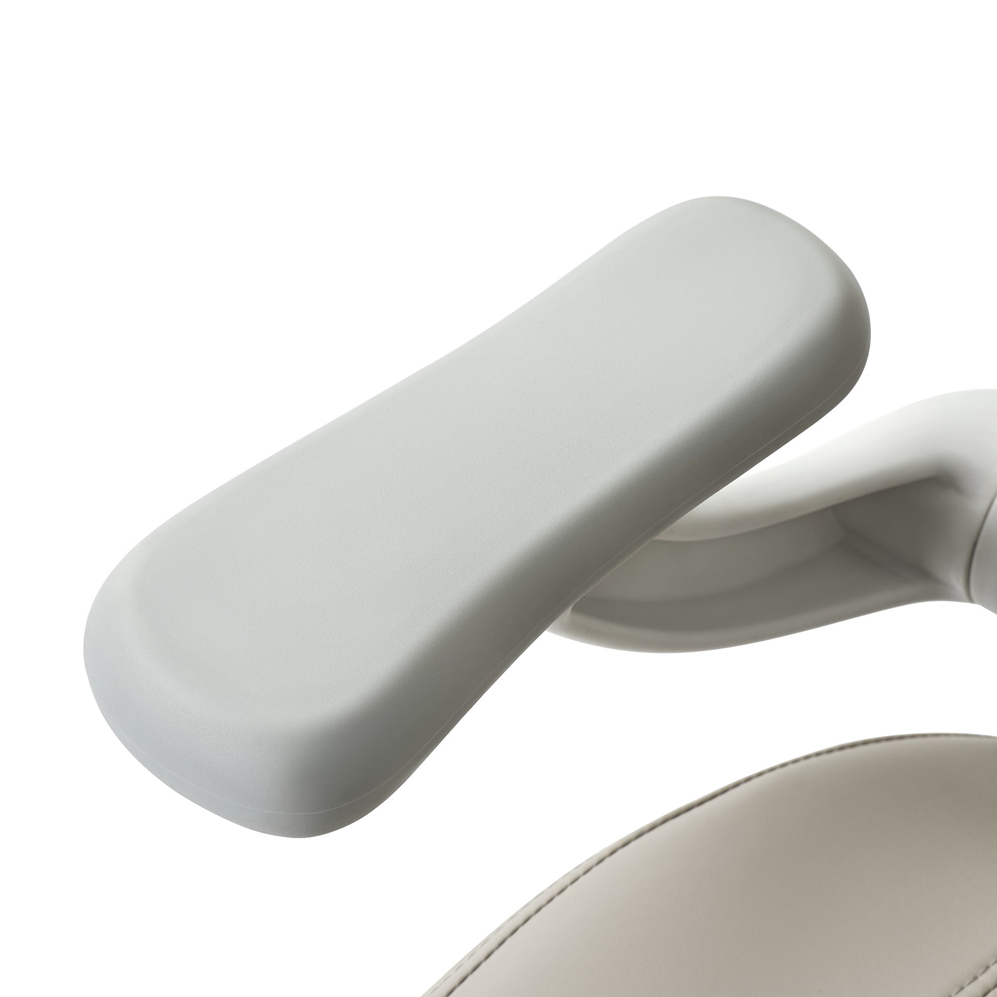 Close-up of a white office chair with adjustable armrest,beige