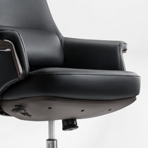 Eureka Ergonomic Royal Renee executive office chair black microfiber leather seat and armrest detail with stitching and chrome accents.