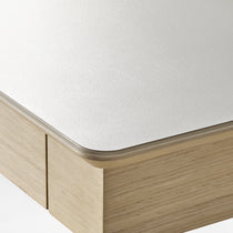 Eureka Ergonomic Ark Pro L-Shaped Desk Detail: White Sintered Stone Top and Wood Accents.