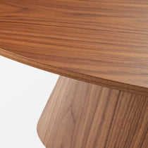 Close-Up of 51 Walnut Oval Coffee Table Showcasing Walnut Veneer and Curved Design.