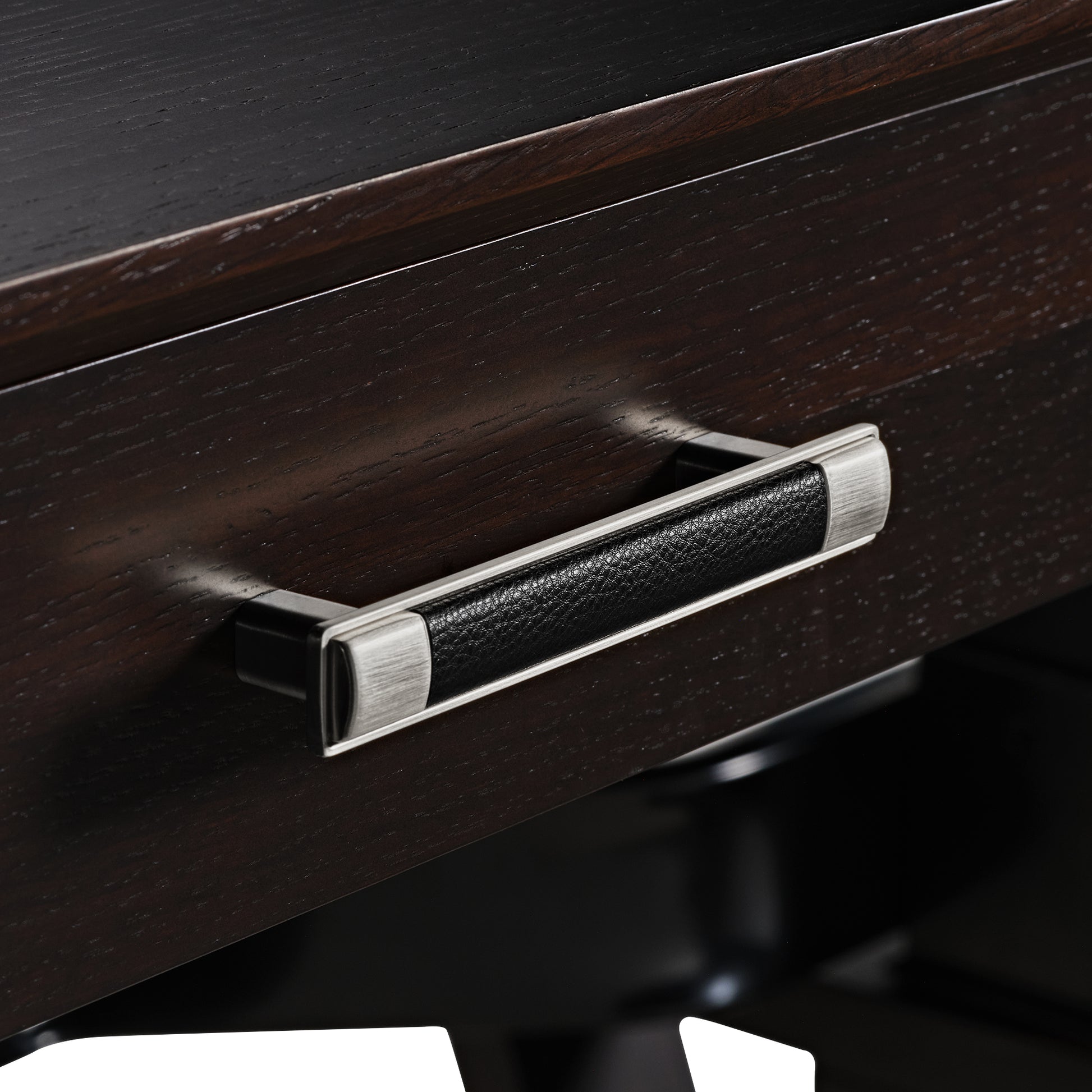 Ark Sws Pro Executive Desk Detail: Silver Handle With Leather Grip and Dark Wood Grain Finish.