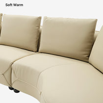 Leah Curved Sofa in Beige Leather, Soft and Warm, Ergonomic Design for Living Room Comfort.