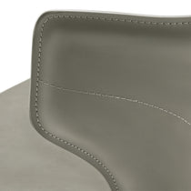 Close-Up Gray Leather Dining Chair Backrest Detail, White Stitching.