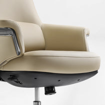 Eureka Ergonomic Light beige Royal Renee executive chair armrest & seat detail: microfiber leather, stitching, carbon fiber.