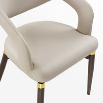 Chantilly Dining Chair With Cream Faux Leather, Dark Brown Legs and Gold Accents.