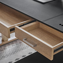 Ark Ex Executive Standing Desk Detail: Oak Veneer Drawer With Silver Handle, Black Faux Leather Desktop.