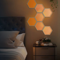 Eureka Lucet Art Lighting: Hexagon Led Lights in a Modern Bedroom Setting.