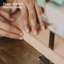 George Slate Desk: Finely Crafted Wood Being Cut, Highlighting Master Craftsmanship.