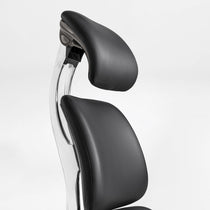 Eureka Ergonomic Forma ergonomic chair headrest and upper backrest detail: black PU leather, stitching, curved aluminum frame.