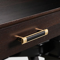 Ark Sws Pro Executive Desk Detail: Gold Handle With Leather Grip, Dark Wood Grain.