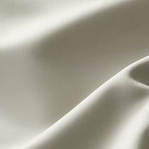 Ember Dining Chair Upholstery Detail in Light Gray, Close-Up View. Reveals the Texture and Quality of the Modern Design.