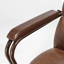 Regal Pu Leather Office Chair Armrest Detail in Brown With Hammered Metal Accents, Ergonomic Design.